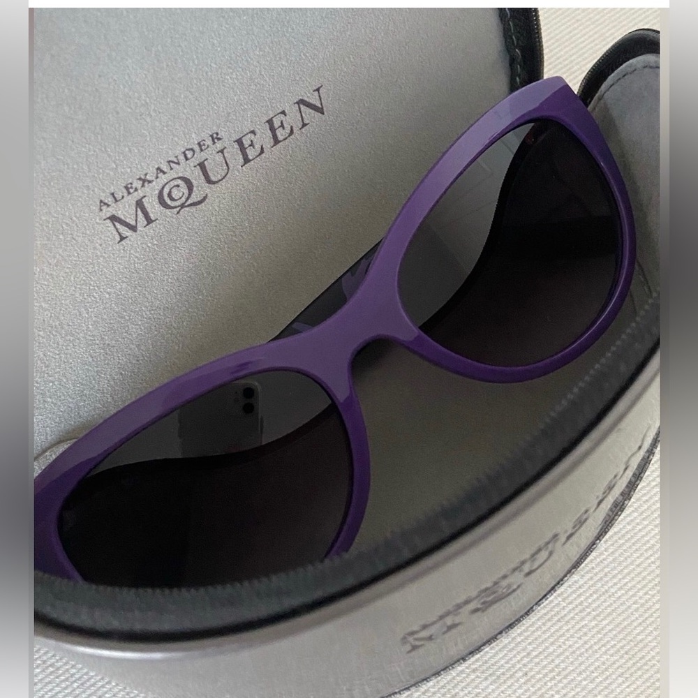Alexander McQueen sunglasses.